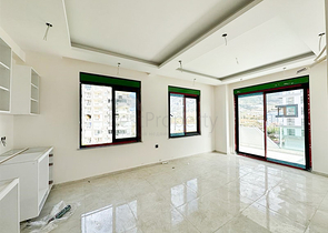 Квартира планировкой 1+1 в строящемся доме в районе Махмутлар