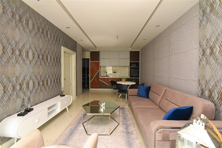 Меблированные апартаменты в 20 м от моря планировкой 1+1 в районе Оба