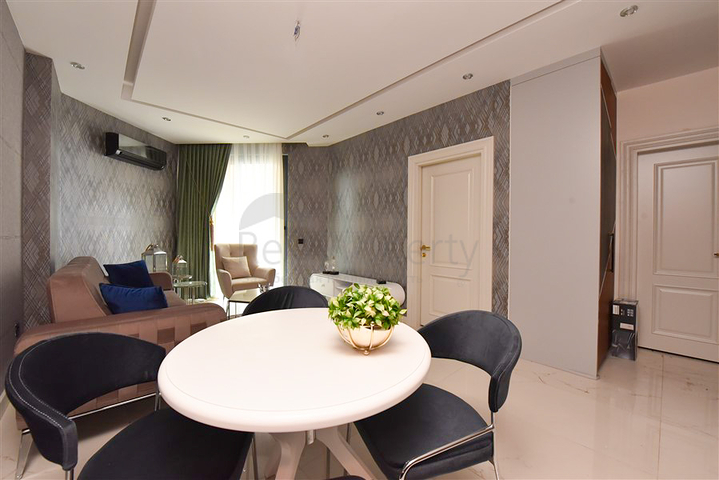 Меблированные апартаменты в 20 м от моря планировкой 1+1 в районе Оба