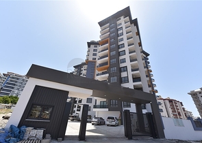 Квартира 1+1 в новом комплексе в районе Махмутлар