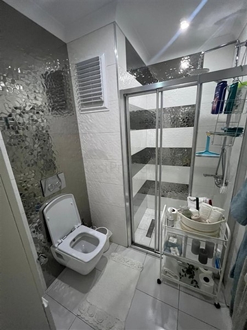 Меблированная квартира 1+1 с красивым видом на море в районе Каргыджак