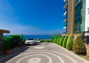 Меблированная квартира 1+1 с красивым видом на море в районе Каргыджак