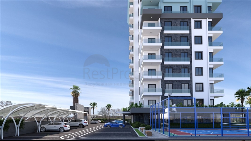 Квартира планировкой 1+1 в новом строящимся современном комплексе в Махмутлар