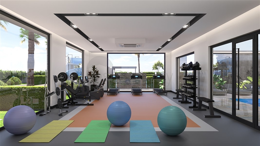 Квартира планировкой 1+1 в новом строящимся современном комплексе в Махмутлар