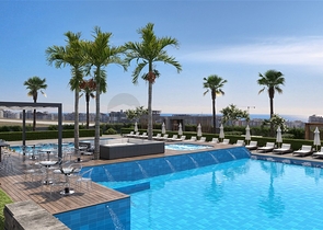 Квартира планировкой 1+1 в новом строящимся современном комплексе в Махмутлар