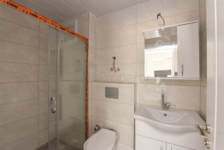 Квартира 1+1 в новом комплексе без инфраструктуры в районе Махмутлар