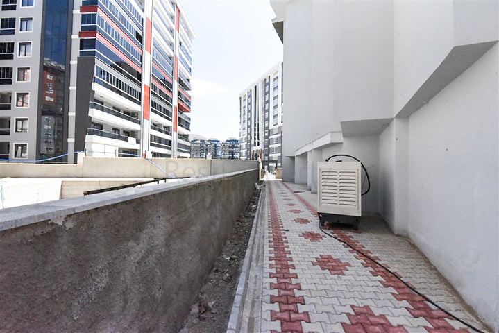 Квартира 1+1 в новом комплексе без инфраструктуры в районе Махмутлар