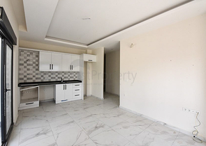 Квартира 1+1 в новом комплексе без инфраструктуры в районе Махмутлар