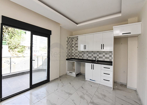 Квартира 1+1 в новом комплексе без инфраструктуры в районе Махмутлар