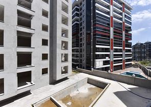 Квартира 1+1 в новом комплексе без инфраструктуры в районе Махмутлар