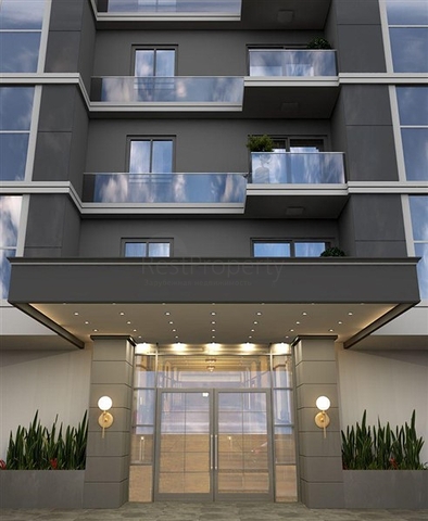 Просторная квартира планировкой 1+1 в строящемся доме в районе Махмутлар