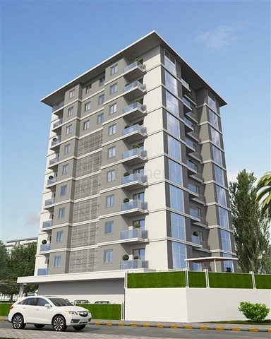 Просторная квартира планировкой 1+1 в строящемся доме в районе Махмутлар