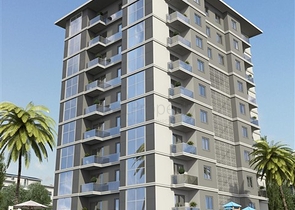 Просторная квартира планировкой 1+1 в строящемся доме в районе Махмутлар