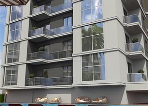 Просторная квартира планировкой 1+1 в строящемся доме в районе Махмутлар