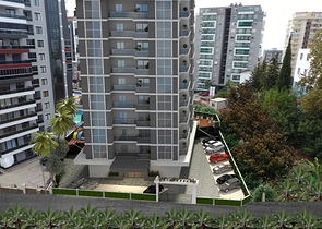 Просторная квартира планировкой 1+1 в строящемся доме в районе Махмутлар