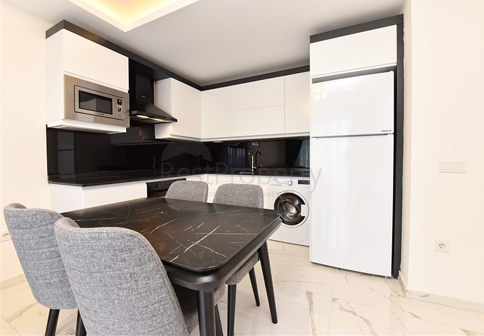 Квартира планировкой 1+1 в районе Махмутлар