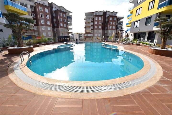 Квартира планировкой 1+1 в районе Махмутлар