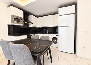 Квартира планировкой 1+1 в районе Махмутлар