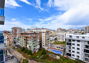 Квартира планировкой 1+1 в районе Махмутлар