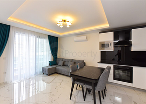 Квартира планировкой 1+1 в районе Махмутлар