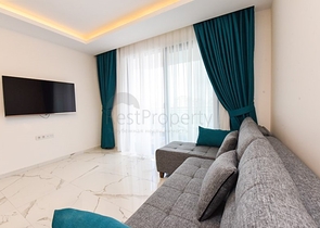 Квартира планировкой 1+1 в районе Махмутлар