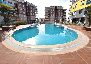 Квартира планировкой 1+1 в районе Махмутлар