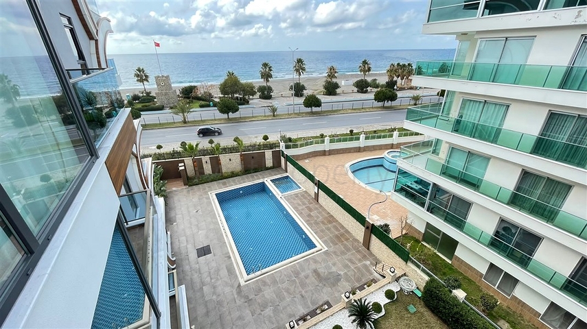 Квартира 1+1 с видом на море в европейском районе Кестель