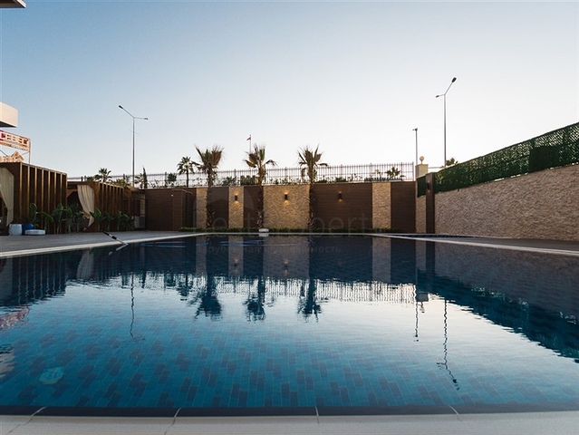 Квартира 1+1 с видом на море в европейском районе Кестель