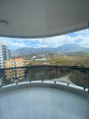 Просторные апартаменты 1+1 в районе Махмутлар