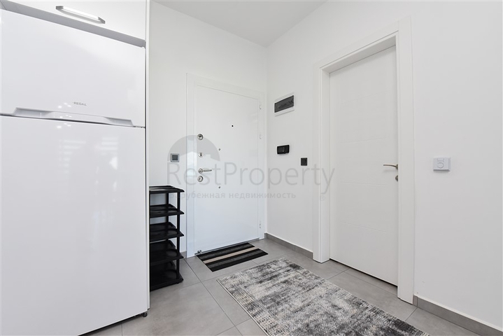 Меблированная квартира 1+1 с видом на море и на горы в районе Махмутлар