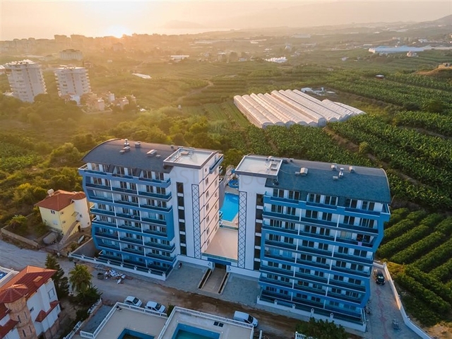 Меблированная квартира 1+1 с видом на море и на горы в районе Махмутлар