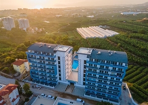 Меблированная квартира 1+1 с видом на море и на горы в районе Махмутлар