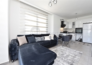 Меблированная квартира 1+1 с видом на море и на горы в районе Махмутлар