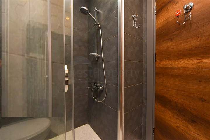 Уютная квартира 1+1 в популярном жилом комплексе в районе Махмутлар