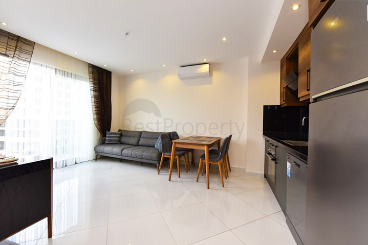 Уютная квартира 1+1 в популярном жилом комплексе в районе Махмутлар