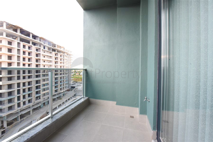 Уютная квартира 1+1 в популярном жилом комплексе в районе Махмутлар