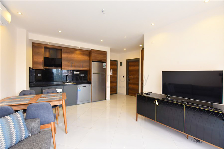 Уютная квартира 1+1 в популярном жилом комплексе в районе Махмутлар