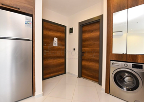 Уютная квартира 1+1 в популярном жилом комплексе в районе Махмутлар