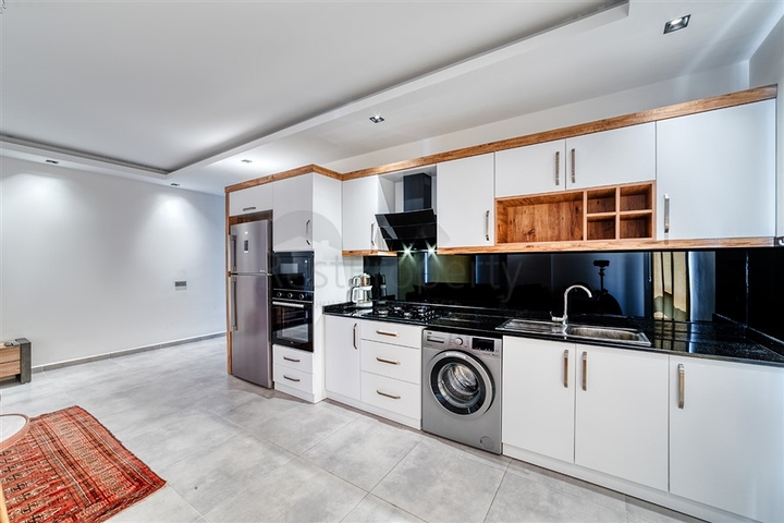 Квартира 2+1 с видом на море в Махмутларе