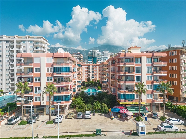 Квартира планировкой 2+1 в районе Махмутлар 50 м от моря