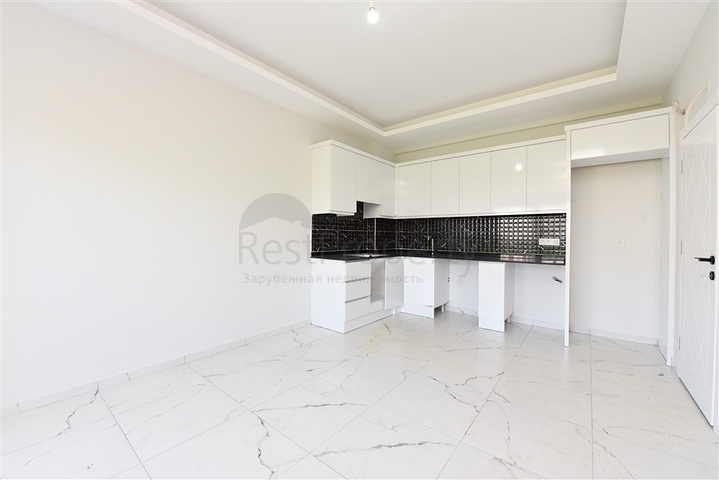 Квартира планировкой 1+1 в новом проекте в районе Махмутлар