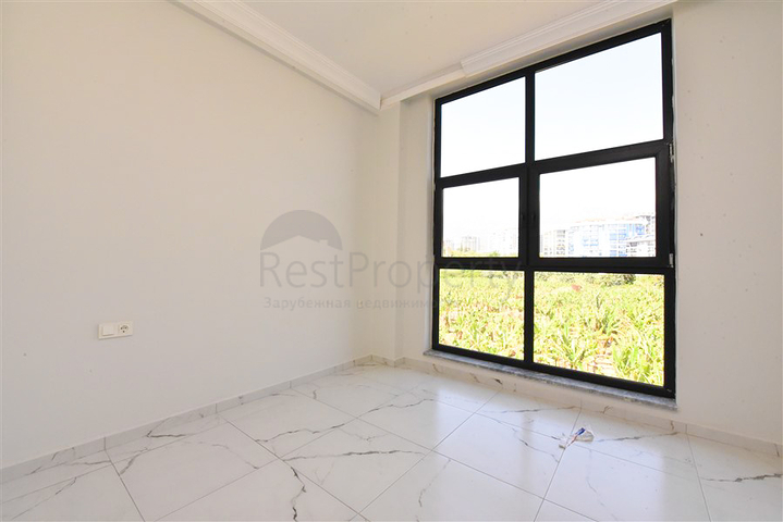 Квартира планировкой 1+1 в новом проекте в районе Махмутлар