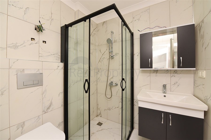 Квартира планировкой 1+1 в новом проекте в районе Махмутлар