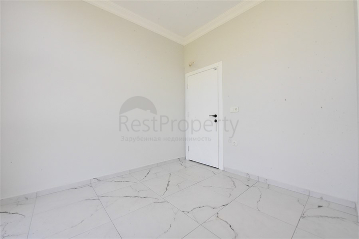 Квартира планировкой 1+1 в новом проекте в районе Махмутлар