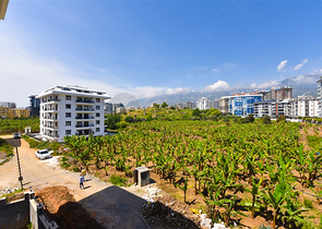 Квартира планировкой 1+1 в новом проекте в районе Махмутлар