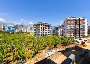 Квартира планировкой 1+1 в новом проекте в районе Махмутлар