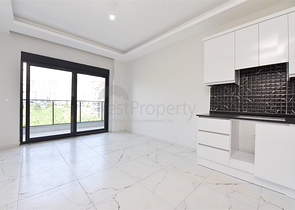 Квартира планировкой 1+1 в новом проекте в районе Махмутлар