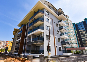 Квартира планировкой 1+1 в новом проекте в районе Махмутлар