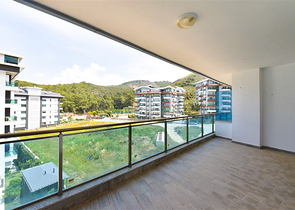 Просторные апартаменты 1+1 в районе Каргыджак