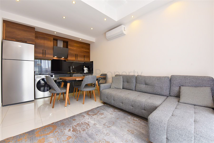 Апартаменты 1+1 в комплексе с отельной инфраструктурой в районе Махмутлар